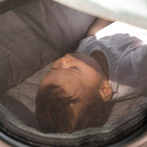 Baby seen through the carrycot vent